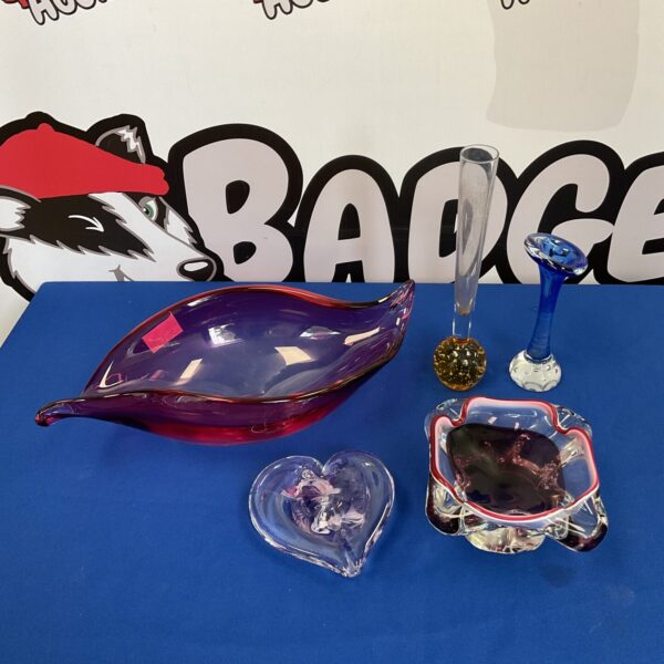 Vibrant purple Murano art glass dish with flowing shape.