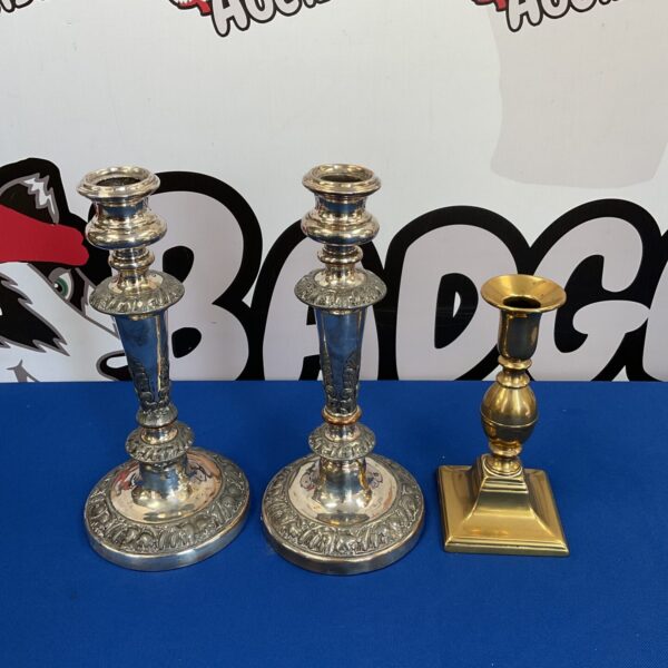 Vintage silverplate and brass candlesticks for table decor.
