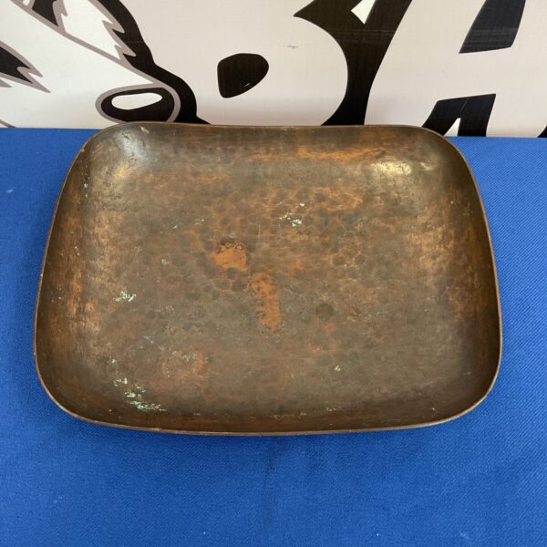 Vintage Handarbeit copper dish with hammered texture.