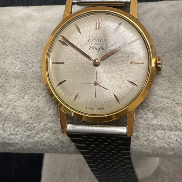 Vintage Osram Ultraflat mechanical wristwatch with a minimalist dial.