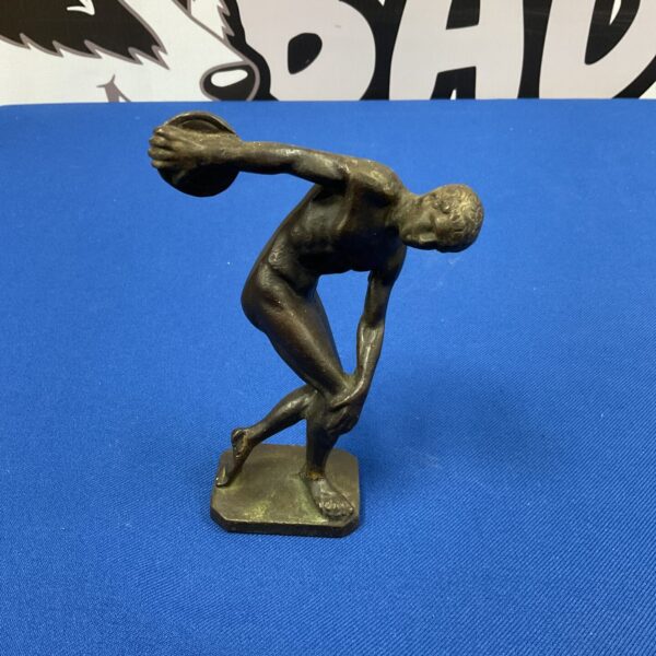 Bronze Discobolus sculpture depicting a Greek discus thrower in action.