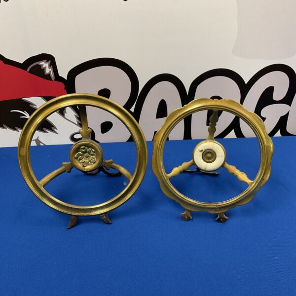 Antique brass folding trivets, a vintage pair for fireside use.