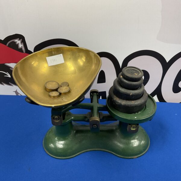 Vintage cast iron balance scales with weights for collecting.