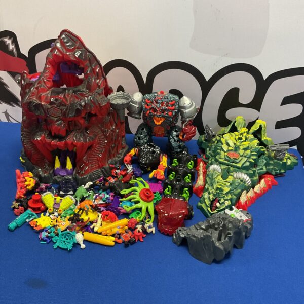 Box of retro MightyMax Playsets, Figures And Accessories Inc Skull Island