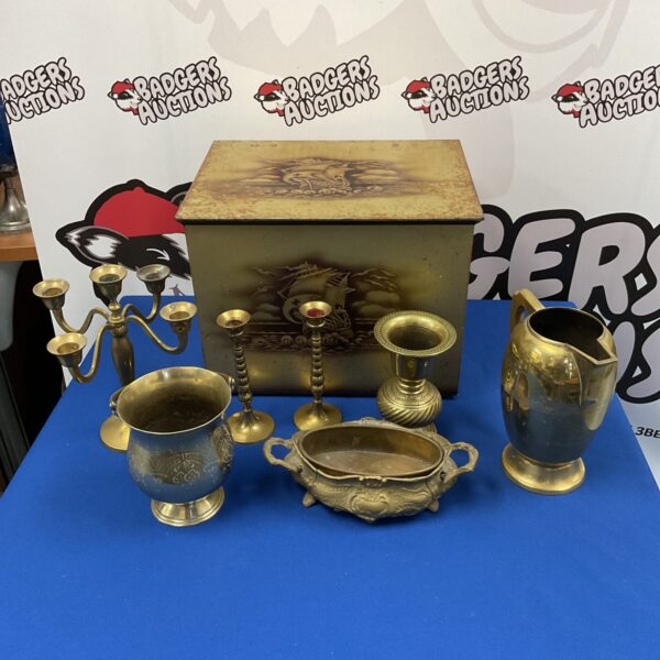 Vintage brass candlesticks and tin coal bin with ship design.
