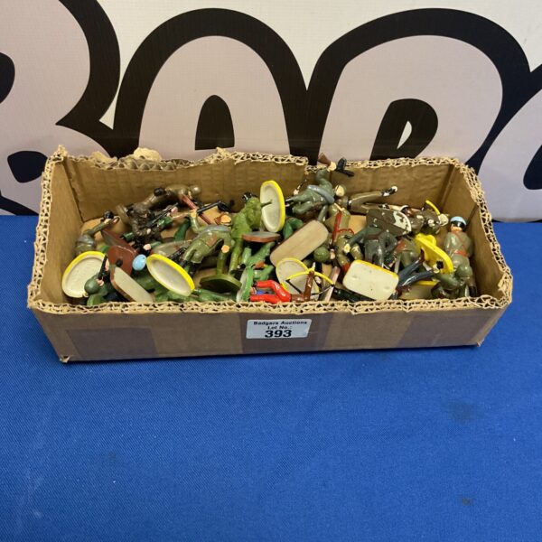 Box of vintage plastic toy soldiers