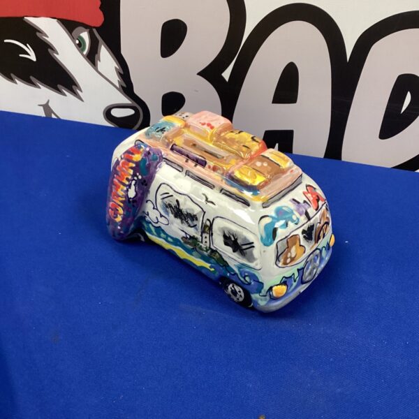 Colourful VW ceramic money box, vintage camper van design.