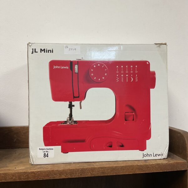 Red John Lewis JL Mini sewing machine, vintage collectible.