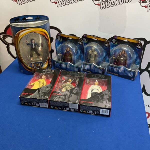 Boxed Doctor Who and Star Wars figures for collectors.