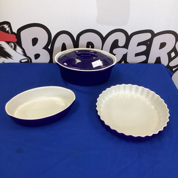 Set of blue casserole and flan dishes