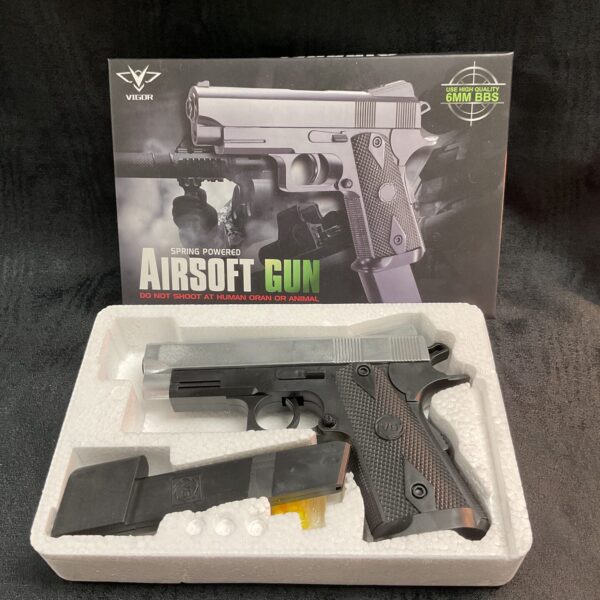 Dark-coloured Bigot airsoft pistol replica for 6mm BBs.