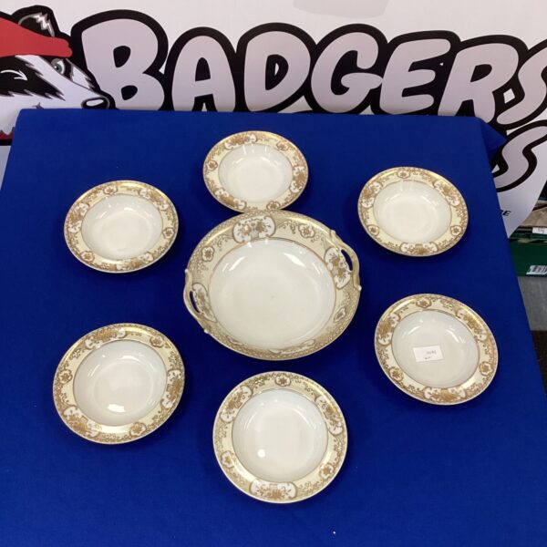 Antique Noritake Golden Baskets porcelain dish set with floral design.
