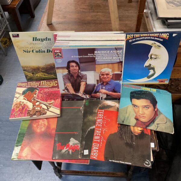 Assorted vinyl records in a collection, classical music albums.