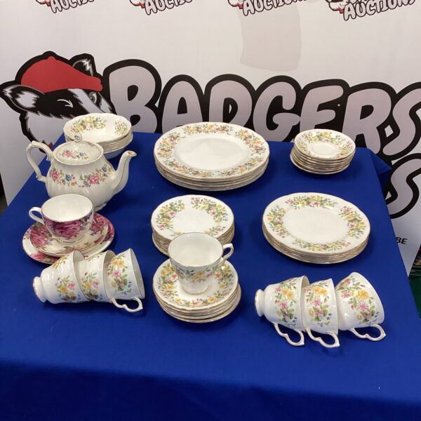 Vintage Colclough bone china tea set with floral design.