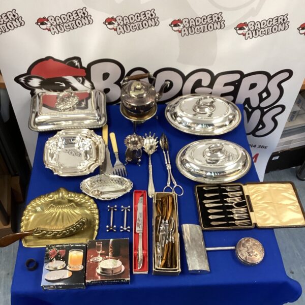 Vintage silverplate collectibles lot including a sugar sifter.