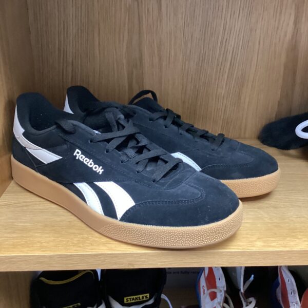 New size 11 Reebok trainers with suede upper and white detailing.