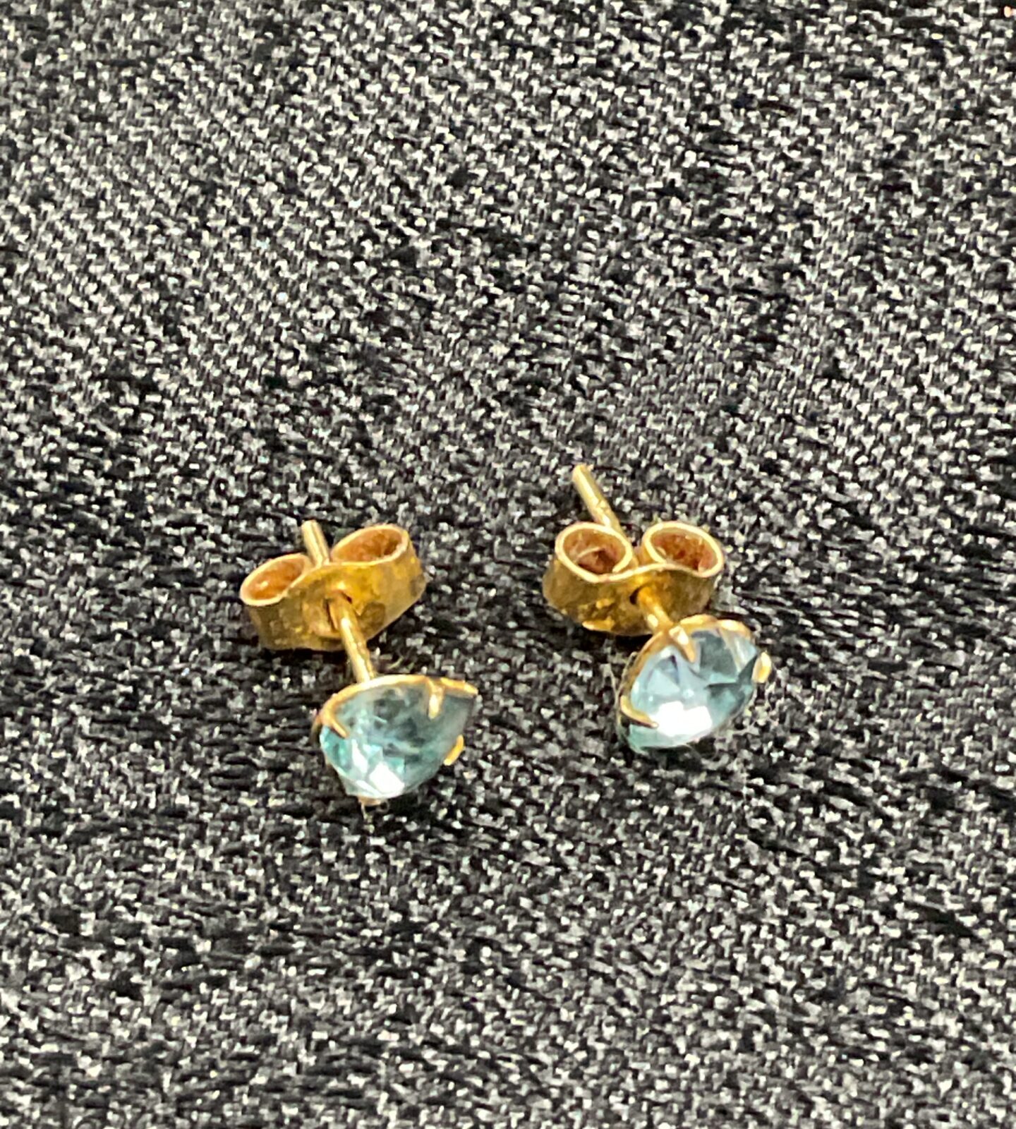 Pair of 9ct gold stud earrings set with aquamarine colour stones