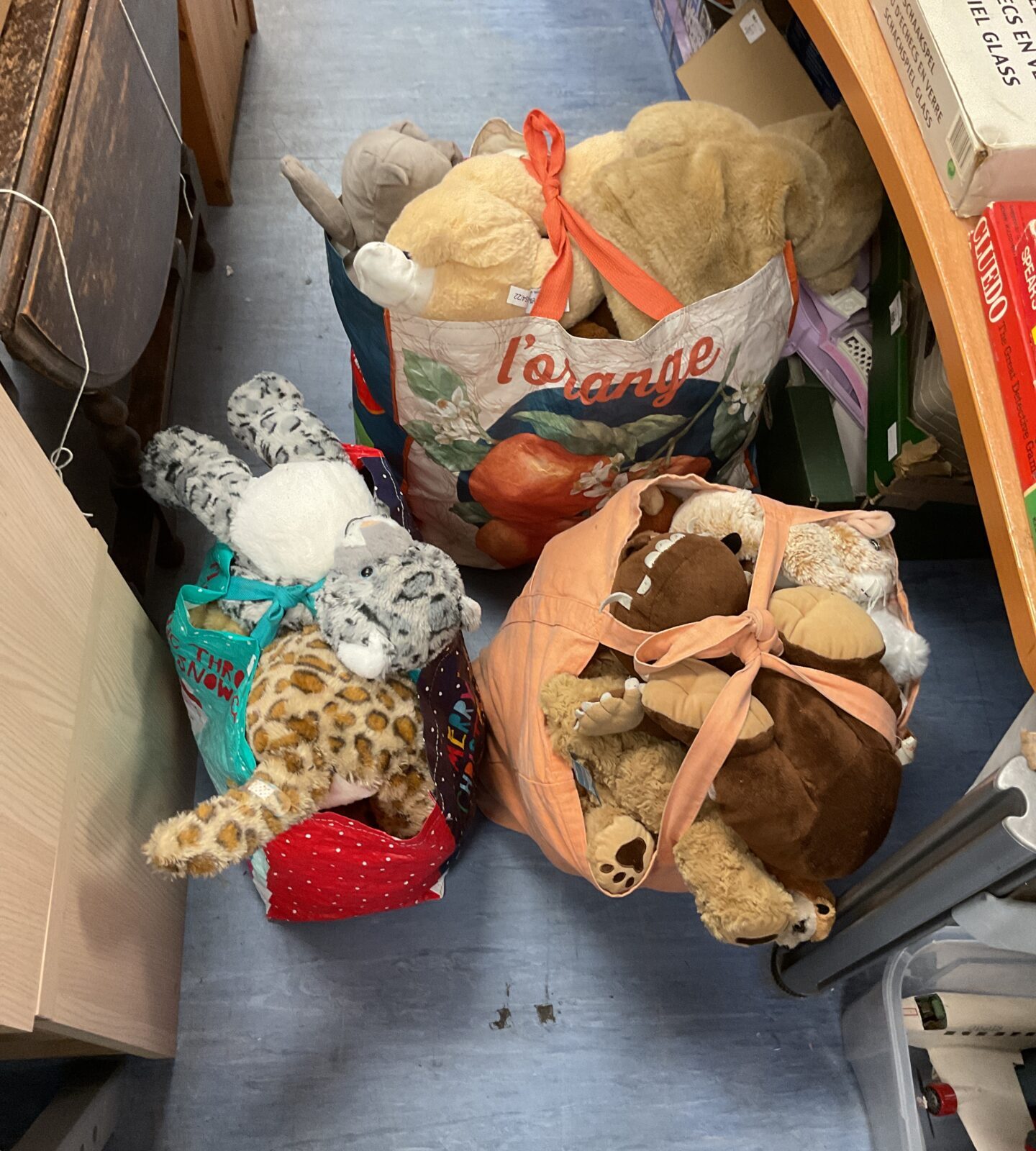 Three bags of assorted soft toys including build a bear