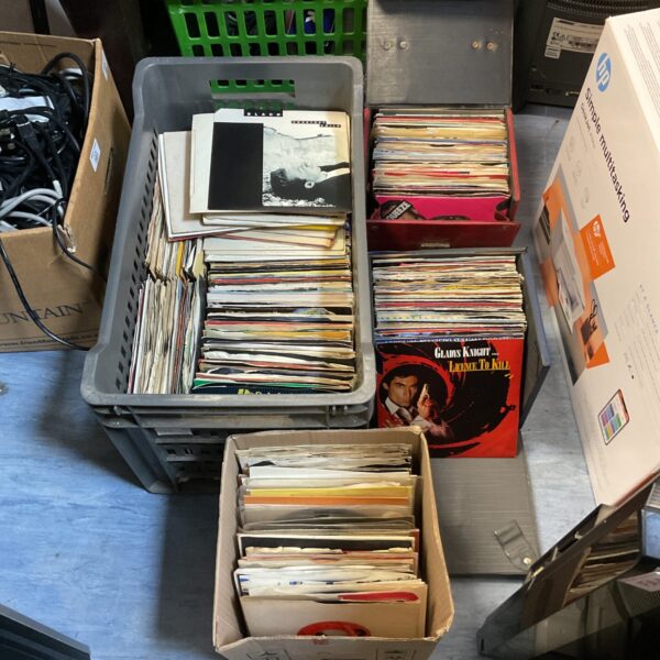 Large collection of 7 inch vinyl records, vintage music singles.
