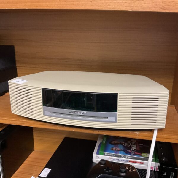Vintage Bose Wave music system tabletop stereo with CD player.