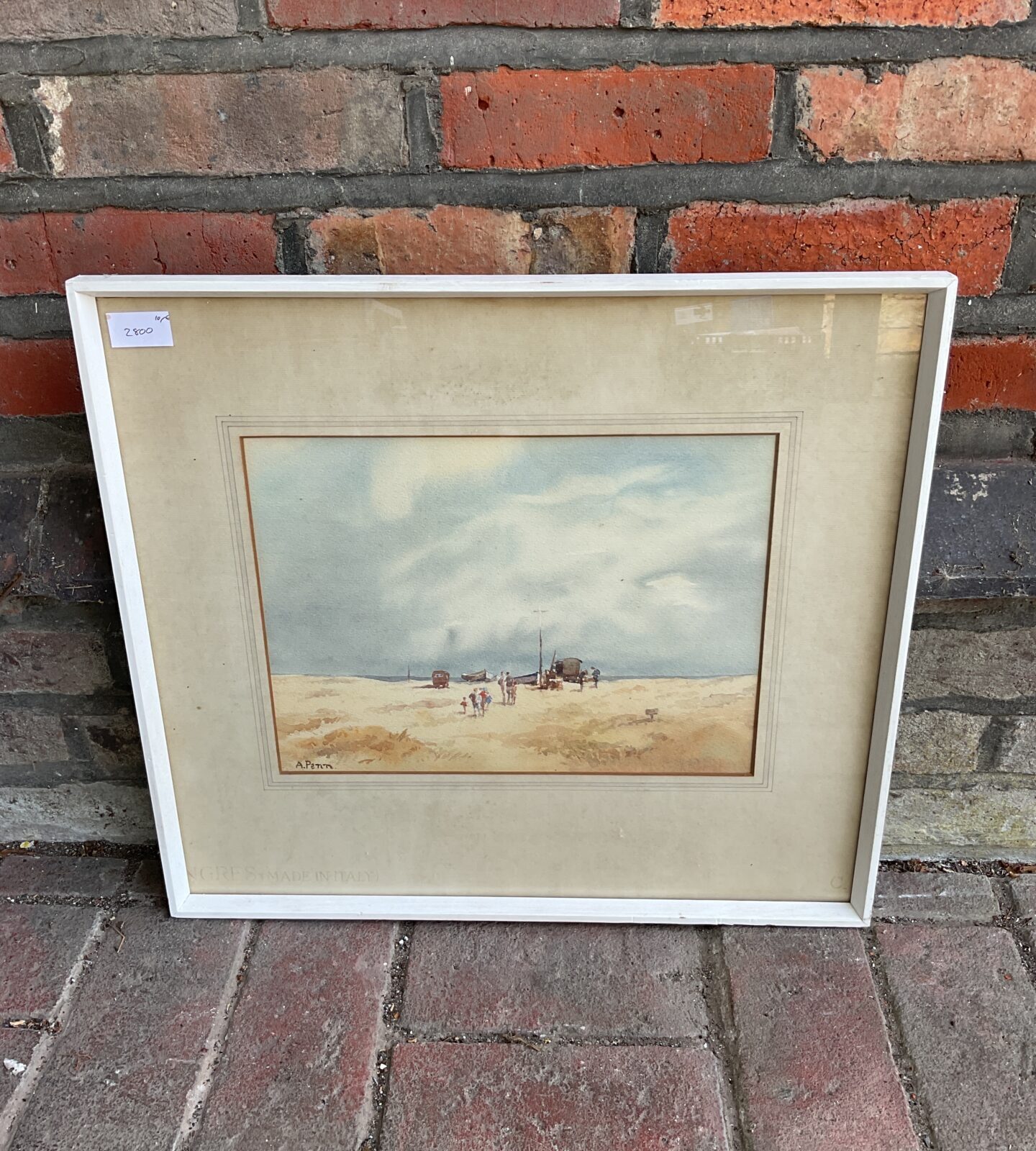 A peter signed watercolour of a family beach gathering