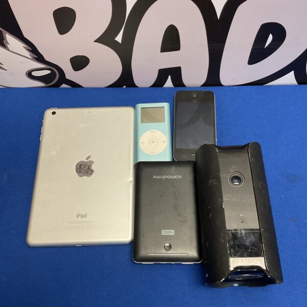 Apple device lot including iPhone, iPod, and iPad.