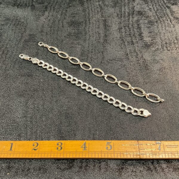Delicate 925 silver bracelets with oval chain links.
