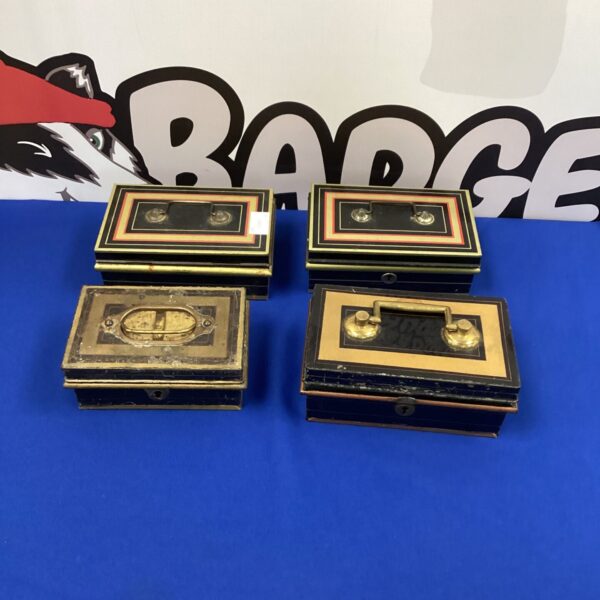 Selection of vintage money boxes, antique savings boxes.