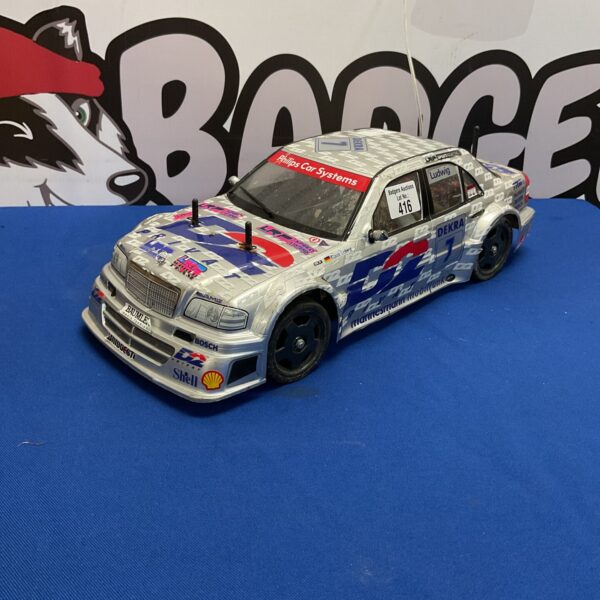 Detailed Mercedes Benz rally RC car with vibrant livery.