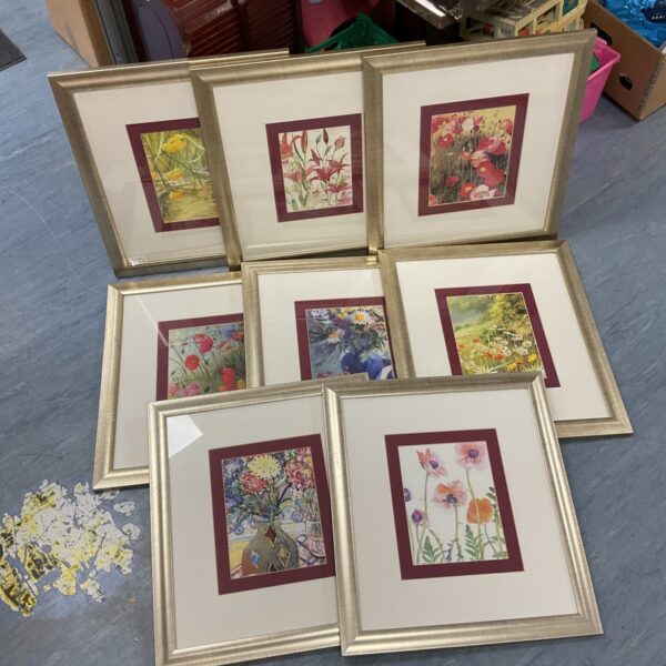Set of eight framed floral prints for vintage home decor.