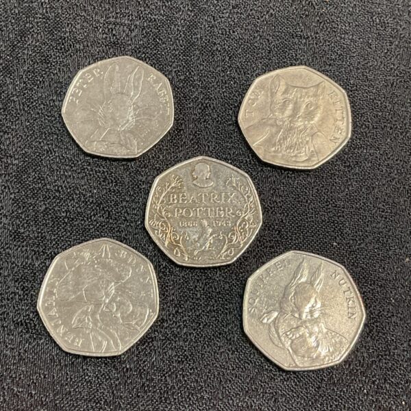 Group of Beatrix Potter 50p coins, collectable UK currency.