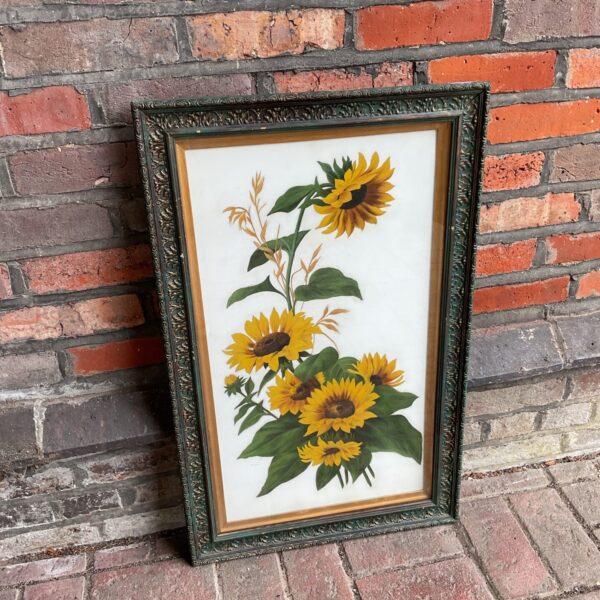 Antique Victorian sunflower painting on opaque glass with ornate frame.