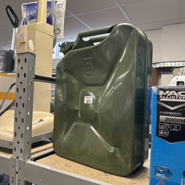 Green vintage 20L metal jerry can for fuel storage.