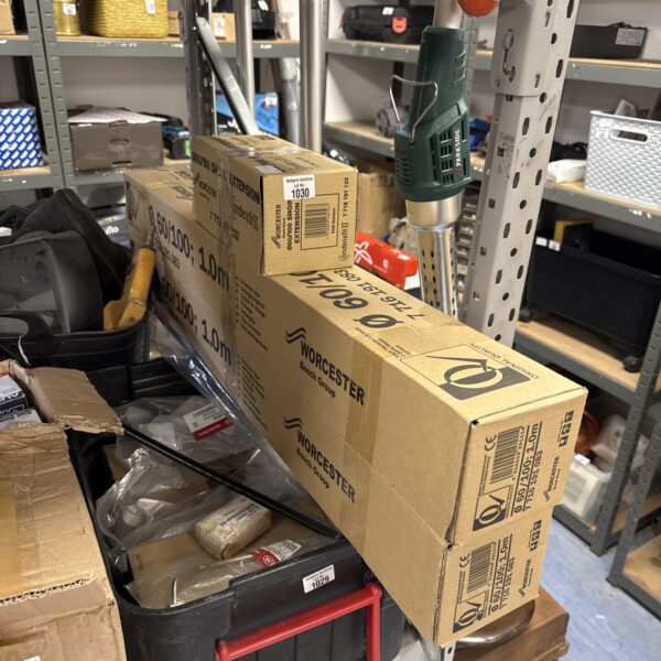 Stack of three Worcester boiler flue extensions for gas boilers.