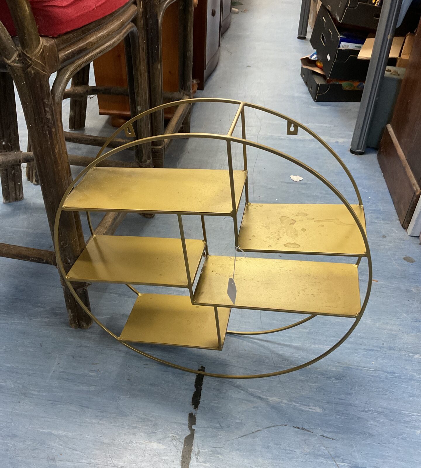 Round metal wall shelving unit