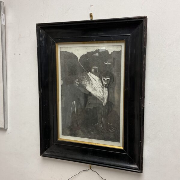Vintage etching of a dramatic witchcraft scene with figures.