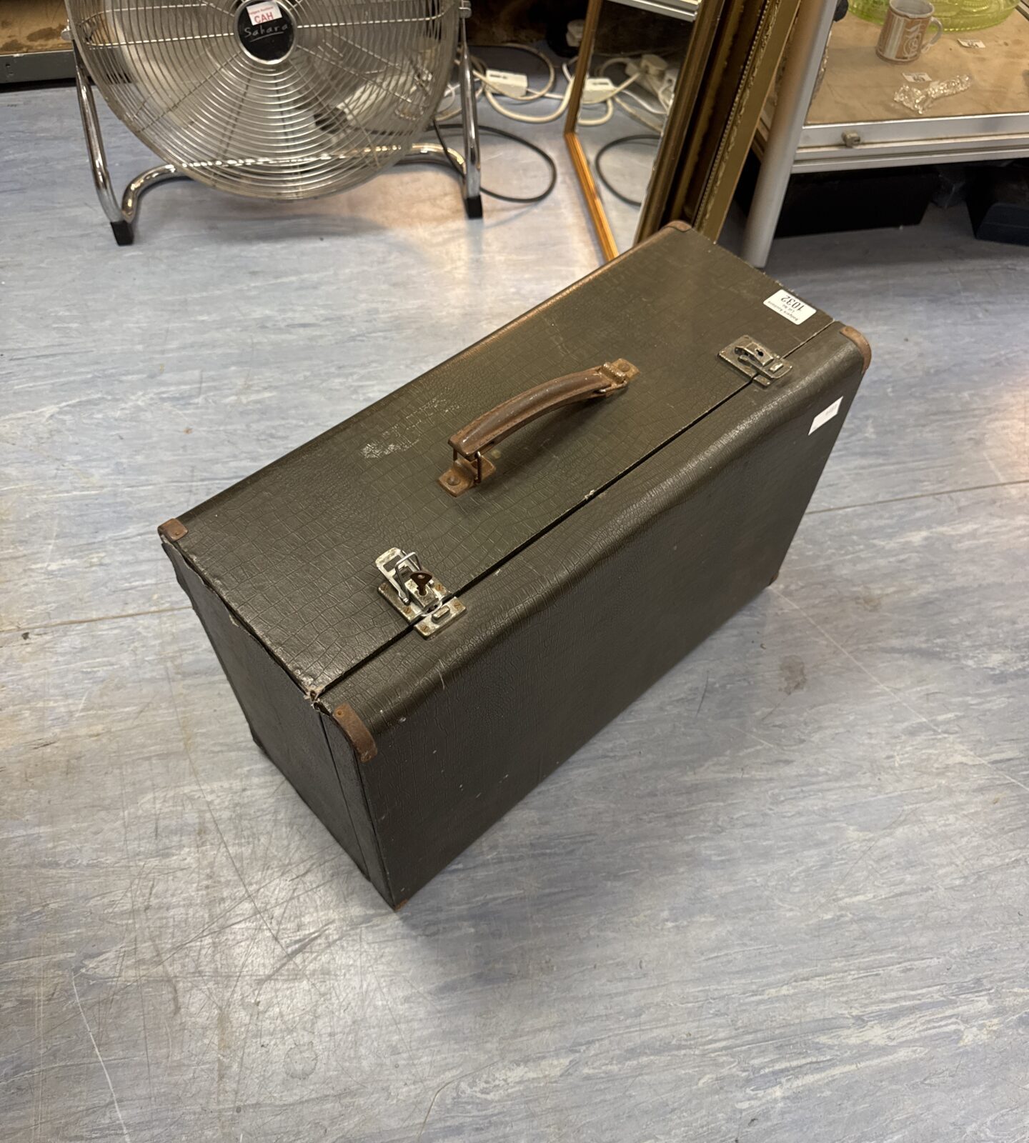 Empty vintage sewing machine case
