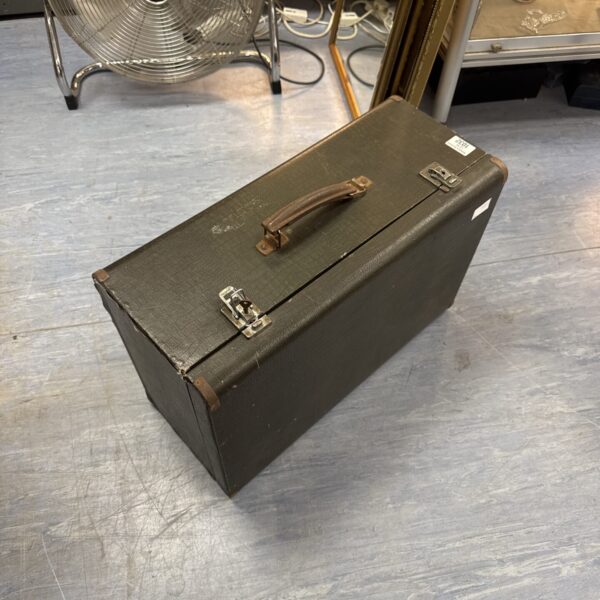 Empty vintage sewing machine case