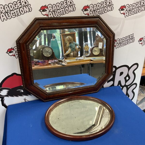 Antique bevelled oak mirror with octagonal frame and aged silvering.