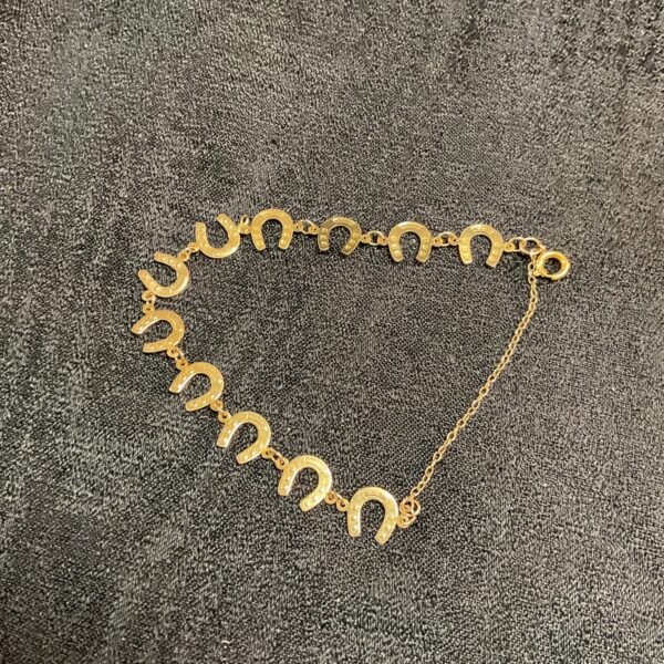 Delicate 9ct gold horseshoe bracelet, vintage style jewellery.
