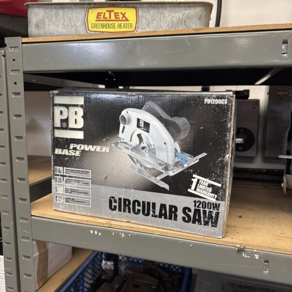 Powerbase circular saw in original packaging, vintage power tool.