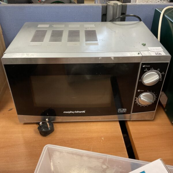 Front view of a vintage Morphy Richards microwave oven.