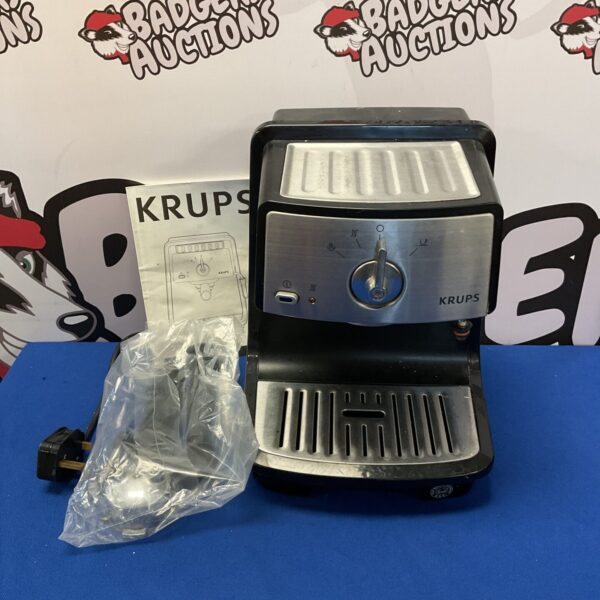 Front view of a silver Krups bean to coffee machine.