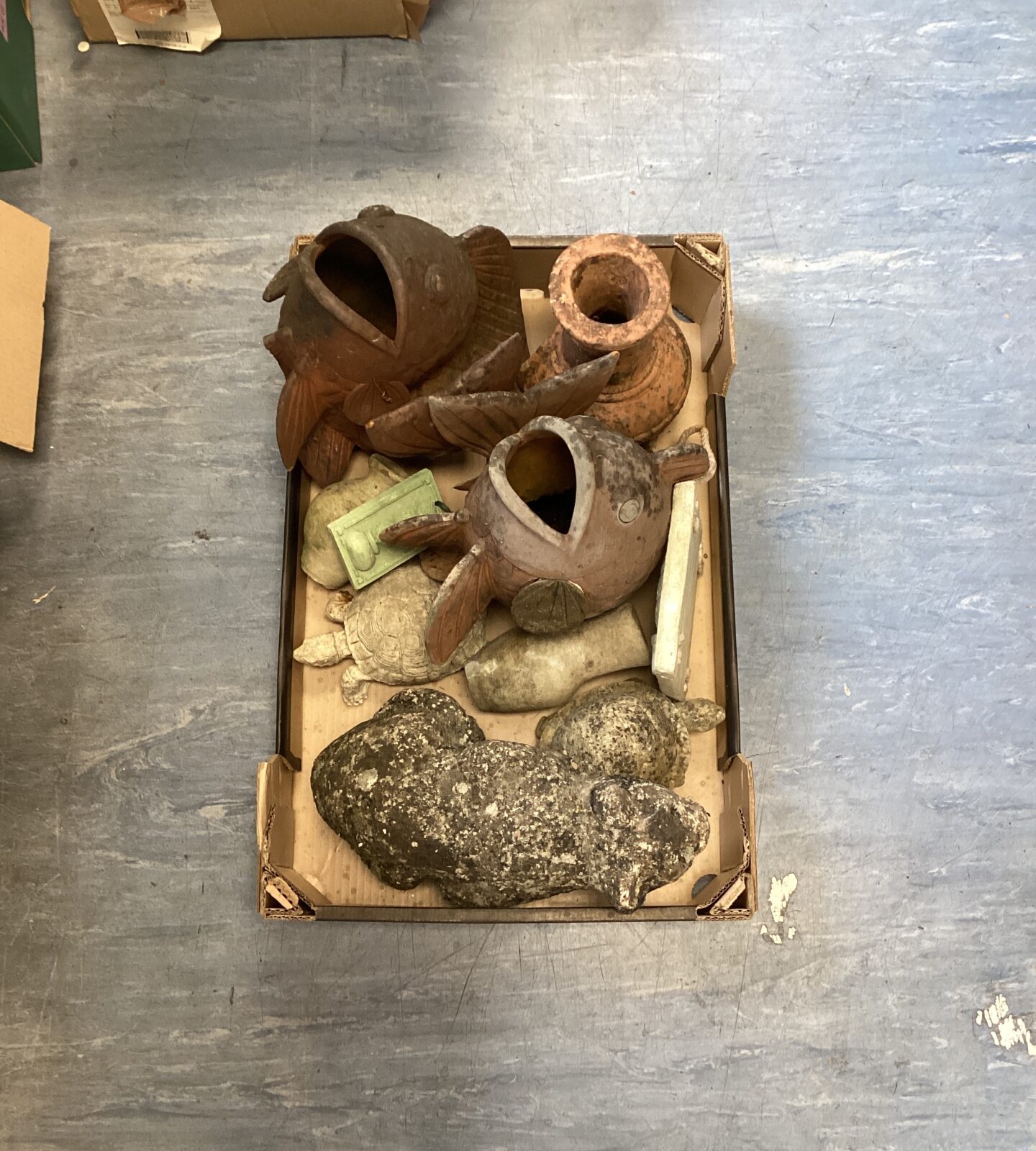 Selection of stone garden ornaments inc terracotta fish planters (one has damaged fin)