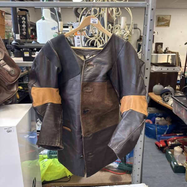 Vintage leather shooting jacket with corduroy detailing.
