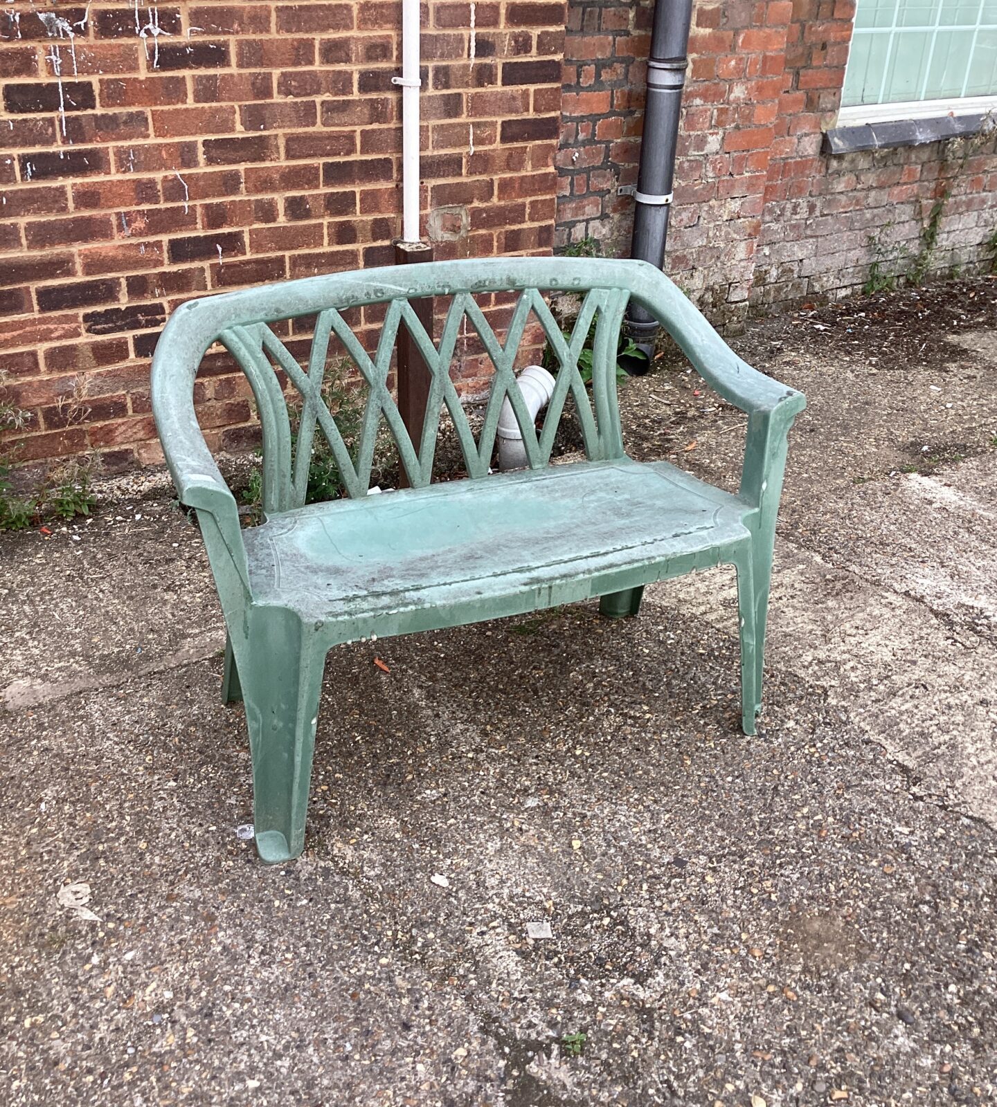 Plastic two seater garden bench