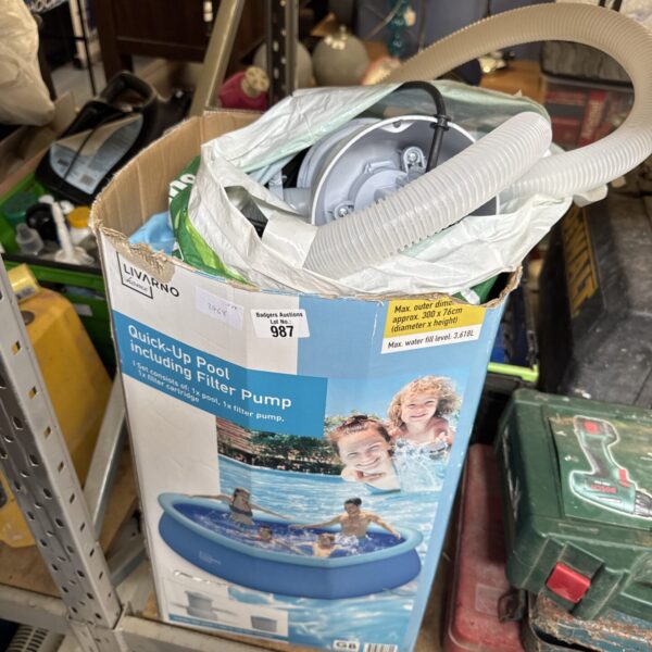 Livarno Home paddling pool with electric pump for summer garden use.