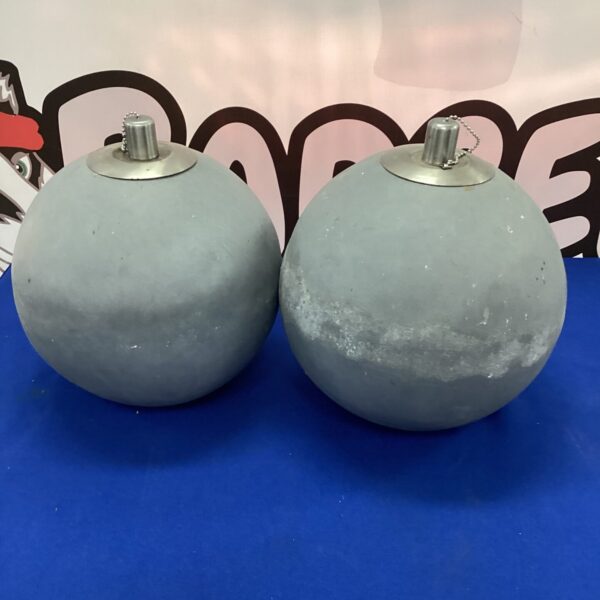 Two stone effect garden oil burners for outdoor use.