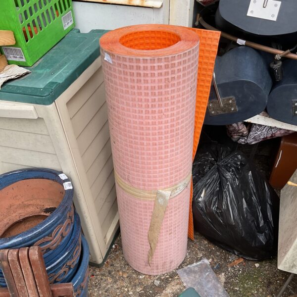 Roll of heavy duty rubber floor matting for workshop use.