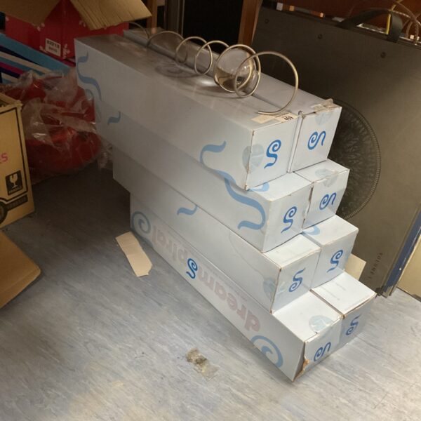 Stack of eight vintage Dreamspirals boxes for collectors.